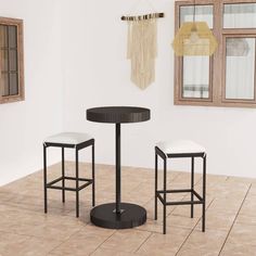 two stools and a table in a room