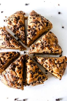 chocolate chip scones arranged in a circle on a white surface