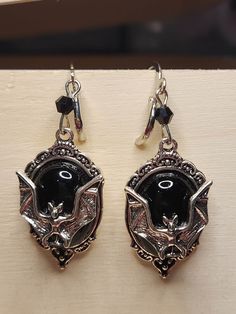 silver bat drop earrings Goth Jewelry Earrings, Goth Jewelry Aesthetic, Silver Gothic Metal Earrings, Goth Drop Earrings, Vampire Style Dangle Earrings, Gothic Silver Dangle Earrings, Chinese Goddess, Handcrafted Handbags, Jewelry Aesthetic