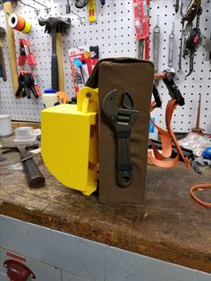 tools are sitting on top of a work bench