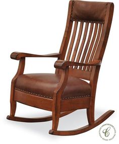 a wooden rocking chair with brown leather upholstered seat