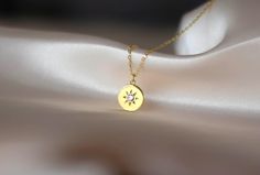 14k gold sunshine pendant necklace with with a cute diamond in the middle.  with its cute dainty look it will complete your everyday shine ♡ length:  comes with 16'' inches chain with 2" inches extension for fine tuning  available in: 14k gold 14k rose gold 14k white gold care tips : we want you to wear your jewelry for a long long time happily so, to maintain the quality of your new jewelry, please: ♡ avoid contact with perfumes, body oils, and other chemicals, including household cleaners ♡ do not use chemical jewelry cleaners ♡ gently polish with a soft, lint-free cloth. please do not use a metal polishing cloth ♡ always store your beloved jewelry in a cool dry place to connect with us: ♡ https://www.instagram.com/somethinggoldjwl to go back to our shop; https://www.etsy.com/shop/someth Beloved Jewelry, Sunshine Necklace, Pendant Necklace Gold, Body Oils, My Sunshine, New Jewelry, Household Cleaners, You Are My Sunshine, Jewelry Cleaner