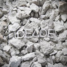 the word ideade spelled in cutout letters on a pile of rocks