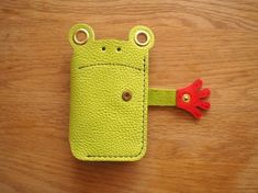 a cell phone case made to look like a frog