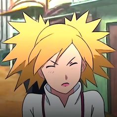 an anime character with blonde hair and white shirt looking at something in front of him