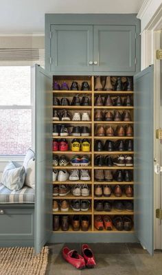 a shoe rack in the corner of a room