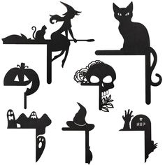 black silhouettes of witches and cats sitting on top of a table with pumpkins