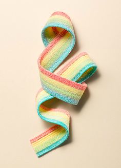 a pair of multicolored hair ties laying on top of each other