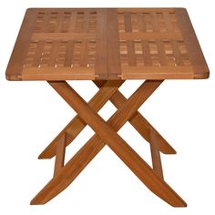 a wooden table with two crossed legs