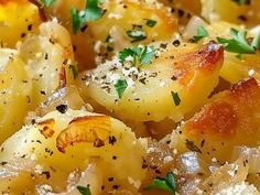 potatoes with parmesan cheese and herbs in a pan