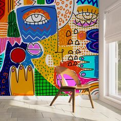 a chair in front of a colorful wall mural