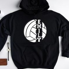 a black hoodie with a volleyball on it