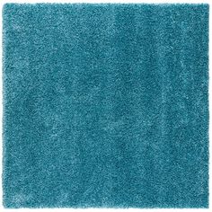 a blue shaggy rug on a white background