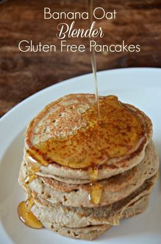 a stack of pancakes sitting on top of a white plate