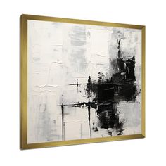 an abstract painting with black and white paint on the wall, framed in gold frame