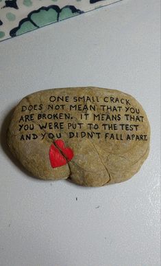 a rock with a poem written on it