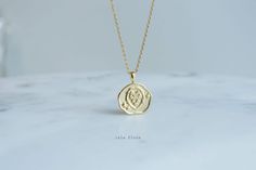 Dainty Leo Zodiac Uneven Pendant Necklace July 23 - August 22 The dainty Leo zodiac pendant, delicately dipped in a layer of radiant 18K gold, showcases the iconic symbol Lion. - 18k Gold Dipped * Brass Casting * Lead & Nickel Free MEASURES * Necklace Length: 16"  * Pendant Width: 0.75" * Pendant Height: 0.75" * Closure: Lobster Claw CARE: * Treat delicately to extend its life. Clean only with a soft, dry cloth. * Chain/Pendants are gold plated so please avoid contact around water such as shower, pool, spa, etc. * Do not wear during sleep or workouts. * Avoid contact with chemicals, sweat, salts, and oils. Your jewelry will last a long time if you care for it properly. PLEASE NOTE: Business days do not include weekends & holidays, as the postal service does not operate on these days. *All Lion Star, 23 August, Jewelry Bridesmaid, Zodiac Pendant, August 22, Leo Zodiac, Pool Spa, Gold Dipped, Necklace Dainty