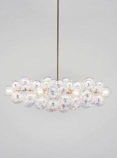 a chandelier with bubbles hanging from it