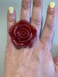 This is an adjustable ring made with epoxi resine and red mica.  Each piece is unique, handmade fabrication. The resin itself is sealer and water proof but to increase the longevity of the ring band itself the ring should be removed before hand washing and should avoid contact with house hold cleaners.  We strive for 100% customer satisfaction. If any problems are encountered upon receipt, please notify me for a quick and friendly resolution.   Don't forget to make sure your Etsy address is correct as that is where I will ship it to.   Check out the main shop page to browse our full line: http://www.etsy.com/shop/enjoywelrydesign Red Resin Ring Suitable For Gifts, Red Resin Rings Suitable For Gifts, Red Resin Rings As A Gift, Gift Red Resin Rings, Red Flower Shaped Rings For Gifts, Red Flower Shaped Rings As Gift, Red Flower-shaped Rings As Gifts, Rose Ring, Big Rings