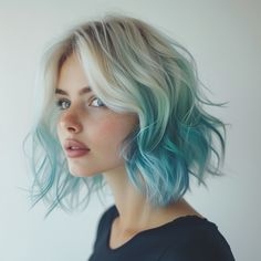 This design starts with a sleek, blunt bob on top, seamlessly transitioning into wavy, mermaid-like layers that cascade down, dyed in shades of ocean blue, turquoise, and seafoam green. The ombré effect mimics the serene colors of the ocean, blending the structured shape of a jellyfish with the fluidity and colors of the sea Sea Foam Hair, Seafoam Green Hair, Jellyfish Haircut, Strong Jawline, Pink Closet, Haircut Inspiration, Edgy Hair, Heart Face Shape, Ombre Effect