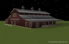 a large red barn sitting on top of a lush green field under a night sky