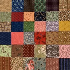 an assortment of different patterns and colors on a piece of cloth that has been cut into squares