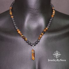 Mens Tiger Eye Lava Necklace, Mens Beaded Necklace, Gemstone Beaded Necklace for Men, Mens Natural Stone Necklace, Aromatherapy Jewelry 🔵 The necklace in the photos is 23 inches. 🔴 There's definitely one for you. The necklace you are looking at has a stylish and unique design. Click to take a look at all the necklaces that will complete your elegance; 🔷 https://jewelrybyneco.etsy.com 🔷 🔵 Presented as stylish jewelry and produced using the highest quality natural stone beads, all of the neck Beaded Necklace For Men, Mens Beaded Necklaces, Aromatherapy Jewelry, Natural Stone Necklace, Tiger Eye Jewelry, Tiger Eye Crystal, Natural Stones Necklace, Gemstone Beaded Necklace, Natural Stone Jewelry