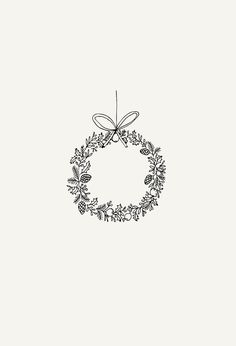 a black and white drawing of a wreath