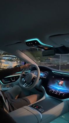 the interior of a car with an illuminated dashboard