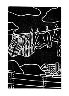 a black and white drawing of clothes hanging out to dry