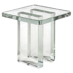 a clear glass side table with two square sections on the top and one rectangular section at the bottom