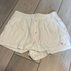 Nwt Stoney Clover Lane White Terry Cloth Shorts Size Small. Open To Reasonable Offers And Cross Posted On M. Low Offers From Resellers Will Be Declined. White Bottoms With Built-in Shorts, White Cotton Shorts For Loungewear, Cute White High Waist Bottoms, White Cotton Bottoms With Built-in Shorts, White Bottoms For Beach Season Loungewear, Beach Season Loungewear Shorts, Loungewear Beach Season Shorts, Casual White Beach Bottoms, Casual White Shorts With Built-in Liner