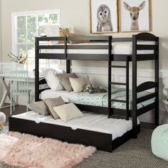 a bunk bed sitting in the middle of a room