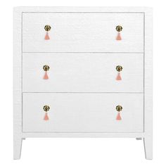 a white chest of drawers with gold knobs on the top and bottom, against a white background