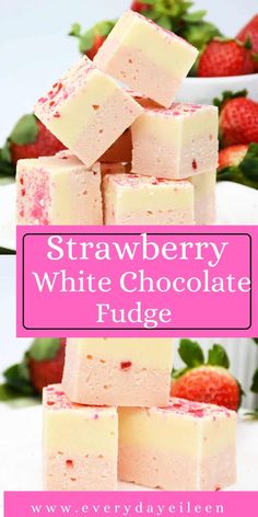 strawberry white chocolate fudge is stacked on top of each other with strawberries in the background