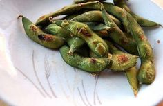 green beans with brown spots in a white bowl