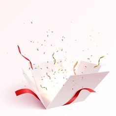 an open white box with red ribbon and confetti falling out of the top