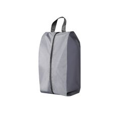 a gray bag with zippers on the front and side, sitting against a white background