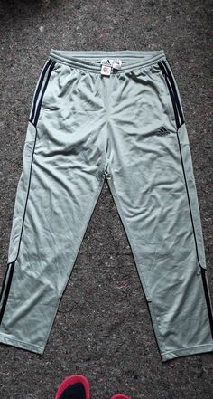 Cool vintage Adidas pants from the 90s Cool glossy finish, 2 pockets Futuristic, party look Size M Full length 101.5 cm In seam 76 cm Front rise 28 cm Futuristic Party, Adidas Hose, 90s Adidas, Adidas Vintage, Party Look, Adidas Pants, Cool Vintage, Vintage Adidas, Party Looks