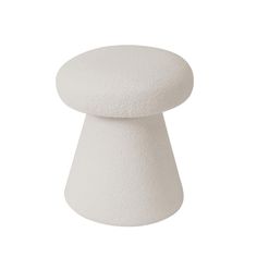 a white stool that is shaped like a mushroom