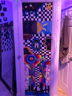 the door is decorated with colorful images