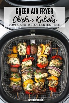 an air fryer with chicken kabobs on it and text overlay that reads, greek air fryer chicken kabobs low - carb keto