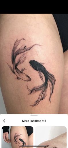 a woman's thigh with an image of a fish on it