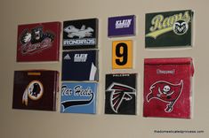 the wall is decorated with many different nfl logos