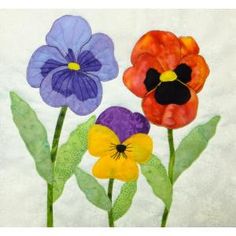 three different colored flowers on a white background