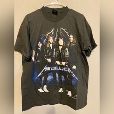 an image of metallicocal on a t - shirt hanging from a hanger