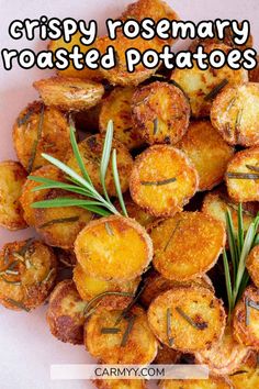 crispy rosemary roasted potatoes on a white plate