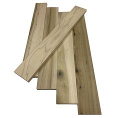 three pieces of wood laying on top of each other