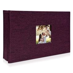 a purple photo album with an image of two people