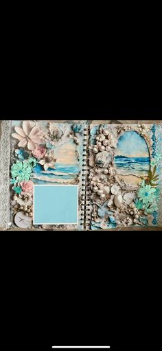 an altered book with shells and flowers on it